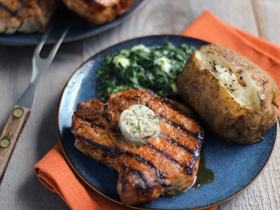 Dry Rubbed Porterhouse Pork Chops with Steakhouse Butter